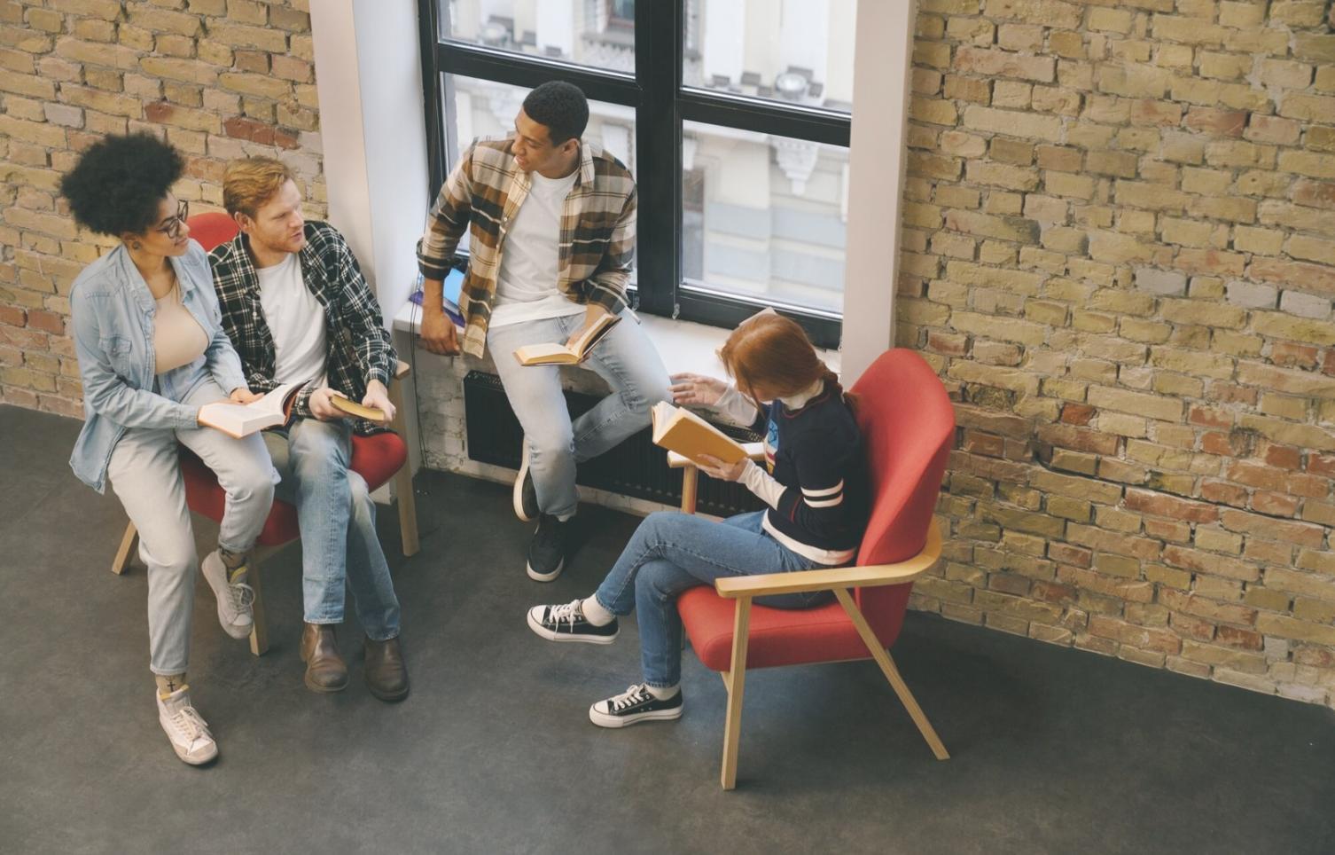 Group of diverse learners collaborating in a modern learning environment